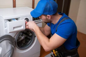 washing machine service Thrissur technician repairing unit